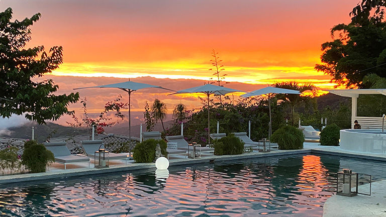 A pool is located at the center of the resort.