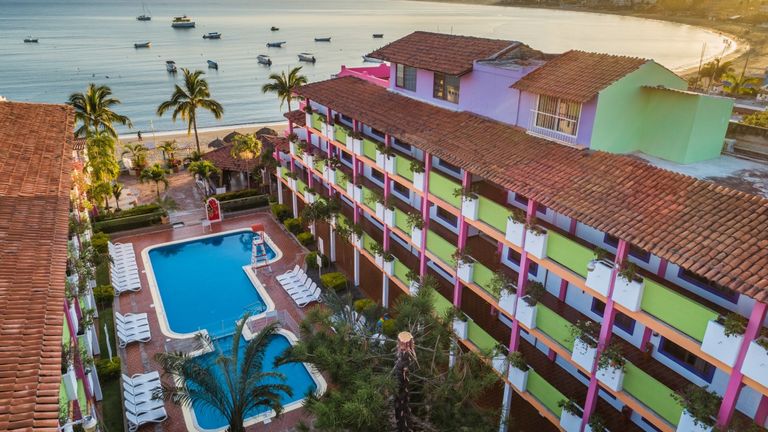 Decameron Los Cocos Guayabitos, a Ramada All Inclusive Resort, is about an hour away from Puerto Vallarta.