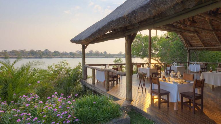 The dining room at Ila Safari Lodge, which offers game drives, walking safaris, river cruises and more.