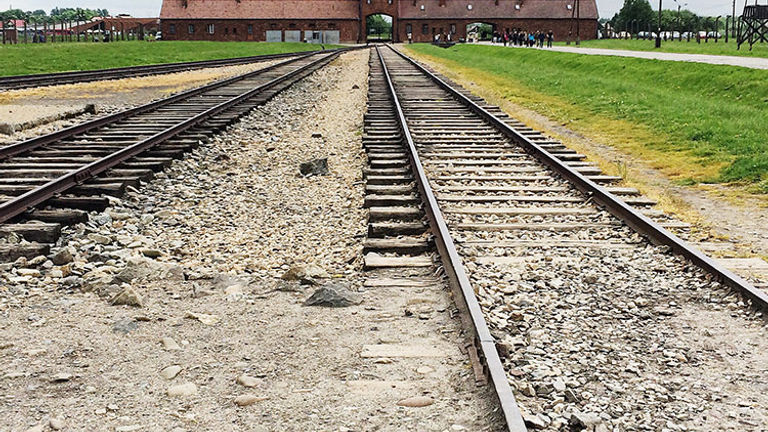 The family visited Auschwitz concentration camp in Poland, where a grandfather had been taken prisoner. // © 2016 Mindy Poder